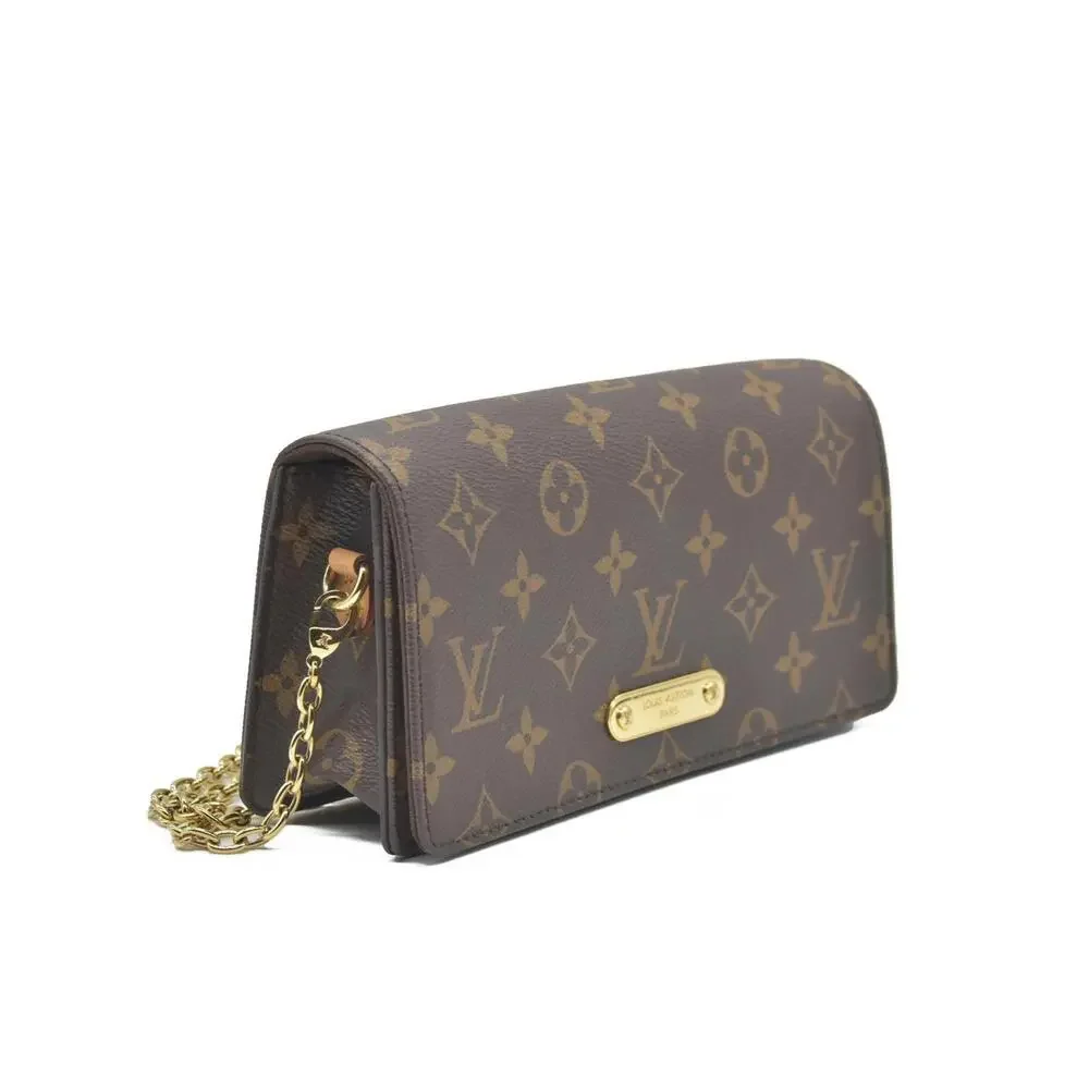 $1750 Louis Vuitton Monogram Wallet On Chain Lily